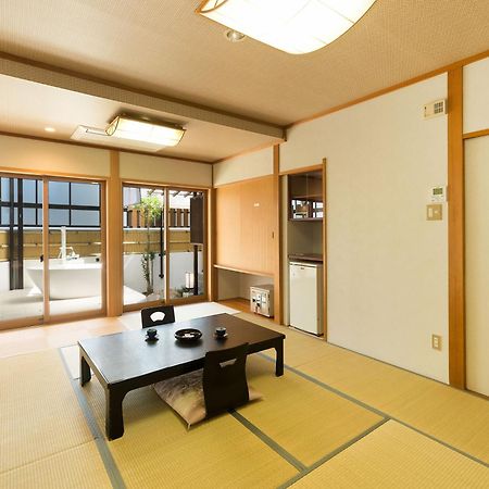 Yuraku Hotel Awara Buitenkant foto